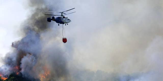 İspanya'nın bazı bölgeleri rekor bir sıcak hava dalgasıyla boğuşurken orman yangınları yanıyor. 